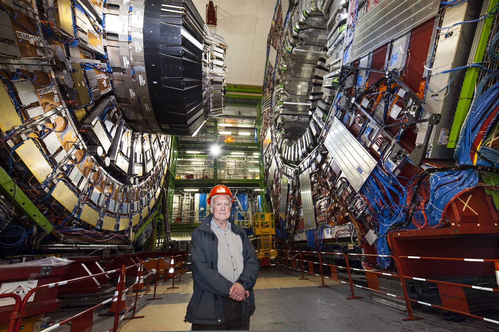 Peter Higgs, in front of the CMS detector.